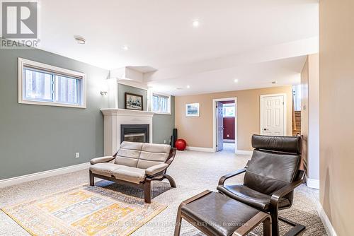 3 Midland Drive, Kawartha Lakes, ON - Indoor Photo Showing Living Room With Fireplace