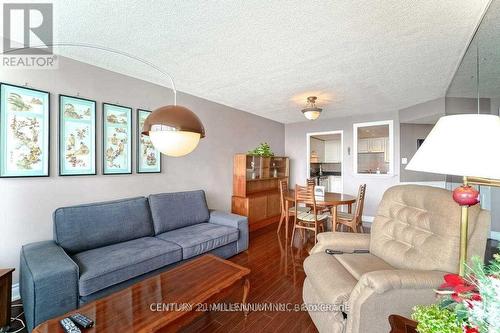 902 - 4450 Tucana Court, Mississauga, ON - Indoor Photo Showing Living Room