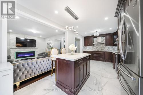 34 Lamp Crescent, Vaughan, ON - Indoor Photo Showing Kitchen With Fireplace With Upgraded Kitchen
