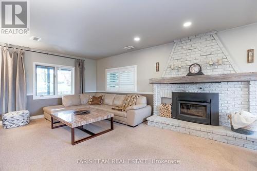 2904 20Th Side Road, New Tecumseth, ON - Indoor Photo Showing Living Room With Fireplace