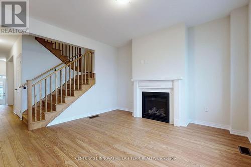 30 Ed Ewert Avenue, Clarington, ON - Indoor Photo Showing Living Room With Fireplace