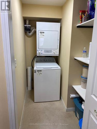 401 - 5235 Finch Avenue E, Toronto, ON - Indoor Photo Showing Laundry Room