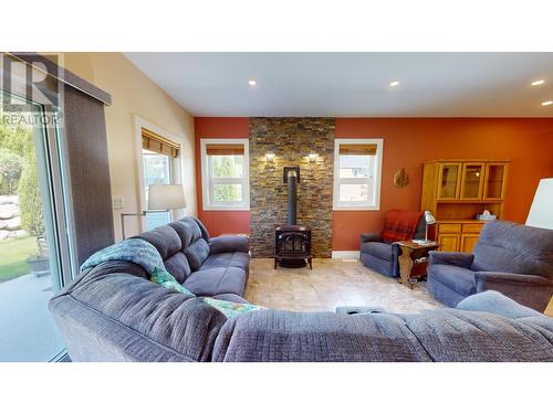 2475 Colin  Crescent, Trail, BC - Indoor Photo Showing Living Room With Fireplace