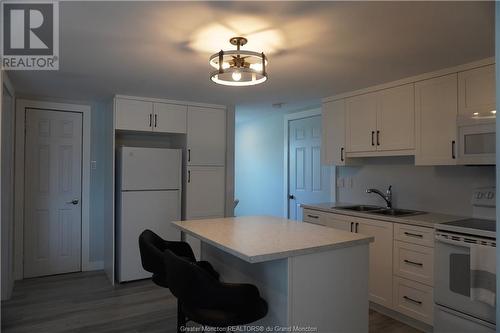 35 Lionel Rd, Bouctouche, NB - Indoor Photo Showing Kitchen With Double Sink