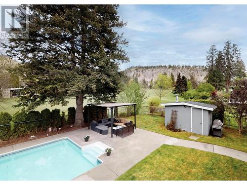 990 Fairway Crescent, Kelowna, BC - Outdoor With In Ground Pool With Backyard