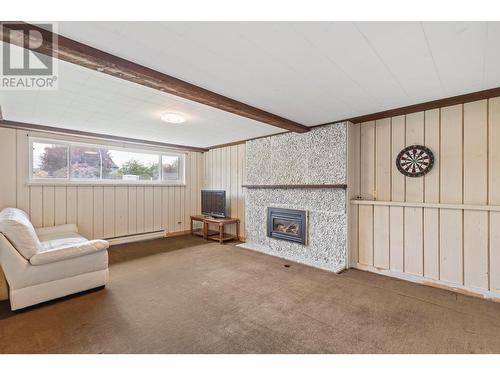 990 Fairway Crescent, Kelowna, BC - Indoor With Fireplace