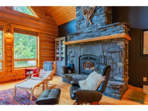 2692 Storbo Heights Road, Slocan Park, BC - Indoor Photo Showing Living Room With Fireplace