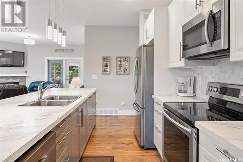 335 Venture Road, Pebble Baye, SK - Indoor Photo Showing Kitchen With Double Sink