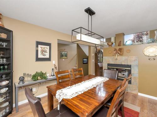 101-5501 20 Street, Vernon, BC - Indoor Photo Showing Dining Room With Fireplace