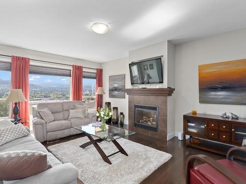 5-2421 Glacier Court, Kelowna, BC - Indoor Photo Showing Living Room With Fireplace
