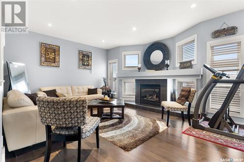 3705 Green Moss Lane, Regina, SK - Indoor Photo Showing Living Room With Fireplace