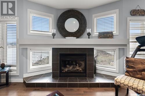 3705 Green Moss Lane, Regina, SK - Indoor Photo Showing Living Room With Fireplace
