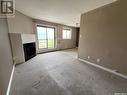 309 3308 33Rd Street W, Saskatoon, SK  - Indoor Photo Showing Other Room With Fireplace 