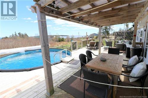 11 Cook Road, Grand Manan, NB - Outdoor With Above Ground Pool With Deck Patio Veranda