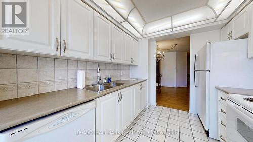 206 - 1121 Steeles Avenue W, Toronto, ON - Indoor Photo Showing Kitchen With Double Sink