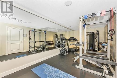 7180 Dixon Dam Road, Vernon, BC - Indoor Photo Showing Gym Room