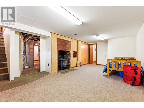 3820 38Th  N Avenue, Creston, BC - Indoor With Fireplace