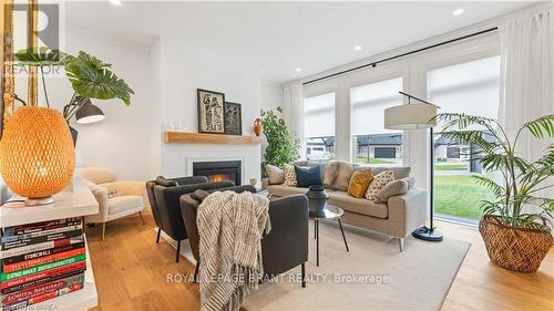 42 Aspen Circle, Thames Centre, ON - Indoor With Fireplace