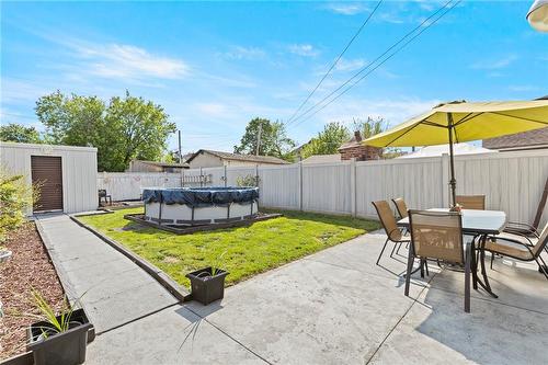 1234 Cannon Street E, Hamilton, ON - Outdoor With Above Ground Pool With Backyard