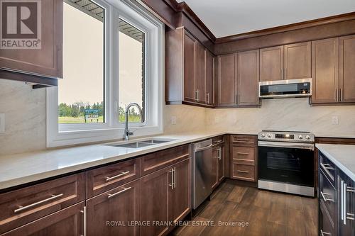 17 Avalon Drive, Kawartha Lakes, ON - Indoor Photo Showing Kitchen With Double Sink
