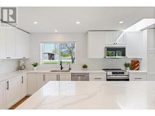 2780 Camp Road, Lake Country, BC - Indoor Photo Showing Kitchen With Double Sink