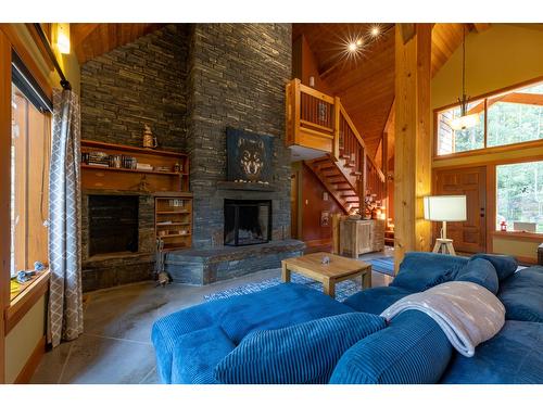 1438 Black Bear Drive, Golden, BC - Indoor Photo Showing Living Room With Fireplace