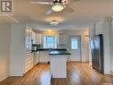 9 406 Tesky Crescent, Wynyard, SK  - Indoor Photo Showing Kitchen With Double Sink 