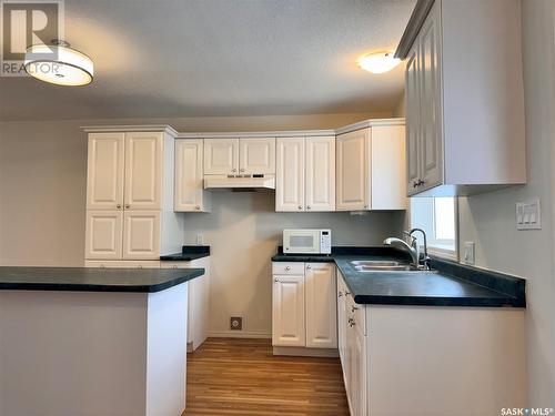 9 406 Tesky Crescent, Wynyard, SK - Indoor Photo Showing Kitchen With Double Sink