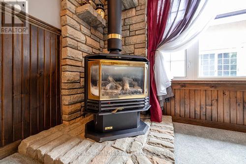 75 Riverside Drive, Kawartha Lakes, ON - Indoor With Fireplace
