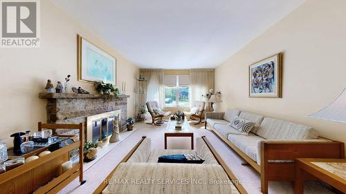 5 Moore Crescent, Brampton, ON - Indoor Photo Showing Living Room With Fireplace