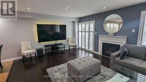 22 Beachville Circle, Brampton, ON - Indoor Photo Showing Living Room With Fireplace