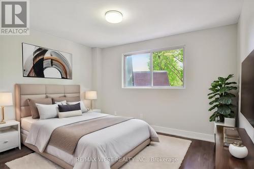 Th61 - 75 Eastdale Avenue, Toronto, ON - Indoor Photo Showing Bedroom