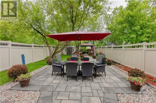 Fully fenced yard with maintenance free fencing on both sides - 577 Foxview Place, Ottawa, ON - Outdoor With Deck Patio Veranda