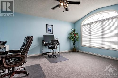 A large, bright room off the front entry could easily be used for a den, office, or FIFTH bedroom! - 400 Van Dusen Street, Almonte, ON - Indoor Photo Showing Office