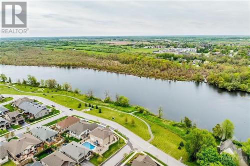 Less than 500 m from the Mississippi River, walking trail, park and community dock. - 400 Van Dusen Street, Almonte, ON - Outdoor With Body Of Water With View