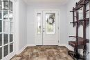 Large open foyer. There's a switch hiding in the hall closet to operate the outdoor Christmas lights. No more fighting the snow and cold to turn them off and on! - 400 Van Dusen Street, Almonte, ON  - Indoor Photo Showing Other Room 