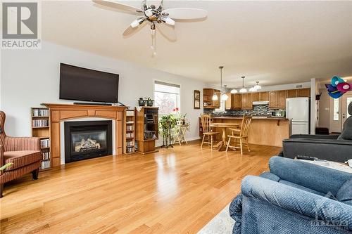 A gas fireplace keeps your home cozy in the winter. - 400 Van Dusen Street, Almonte, ON - Indoor Photo Showing Living Room With Fireplace