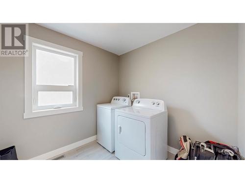 23 Raven Court, Osoyoos, BC - Indoor Photo Showing Laundry Room