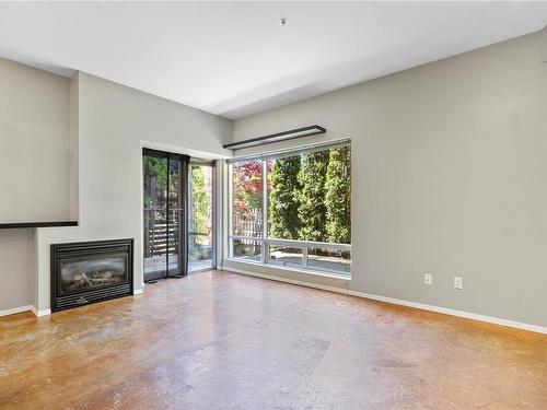 104-932 Johnson St, Victoria, BC - Indoor With Fireplace