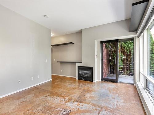 104-932 Johnson St, Victoria, BC - Indoor With Fireplace