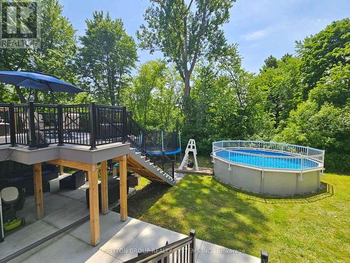 30 Pontiac Court, Brampton, ON - Outdoor With Above Ground Pool With Deck Patio Veranda With Backyard
