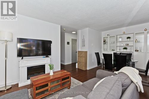 30 Pontiac Court, Brampton, ON - Indoor Photo Showing Living Room With Fireplace
