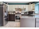 4934 Twedle Avenue, Terrace, BC  - Indoor Photo Showing Kitchen With Double Sink 