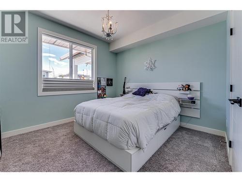 581 Mt. Ida Crescent, Coldstream, BC - Indoor Photo Showing Bedroom