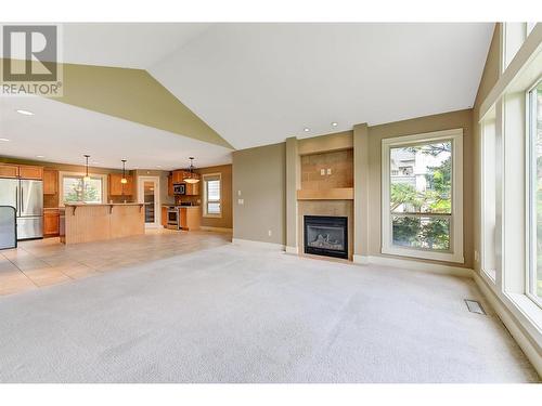 561 Still Pond Lane, Kelowna, BC - Indoor With Fireplace