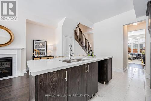 307 Swan Park Road, Markham, ON - Indoor Photo Showing Kitchen With Fireplace With Double Sink
