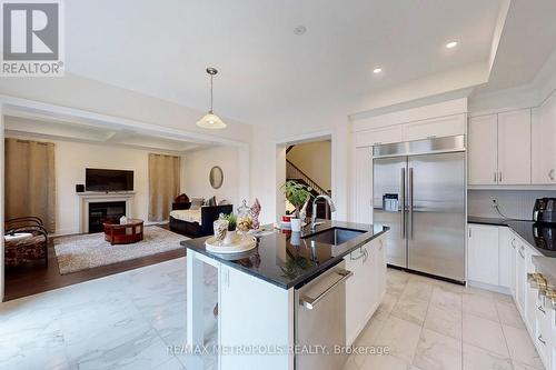 100 Ballantyne Boulevard, Vaughan, ON - Indoor Photo Showing Kitchen With Fireplace With Upgraded Kitchen