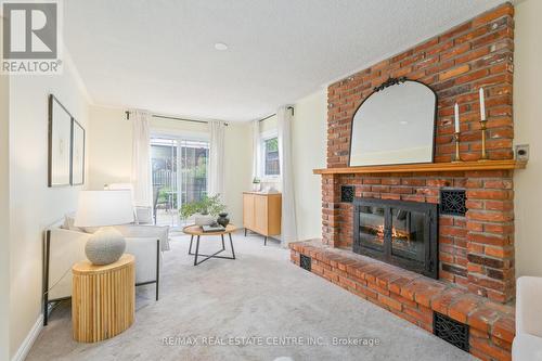 273 Laurier Avenue, Milton, ON - Indoor Photo Showing Living Room With Fireplace