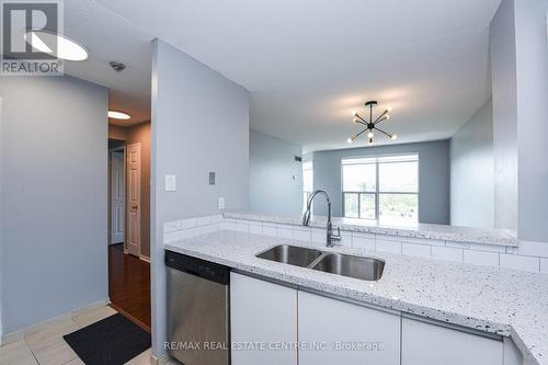 1005 - 2177 Burnhamthorpe Road W, Mississauga, ON - Indoor Photo Showing Kitchen With Double Sink