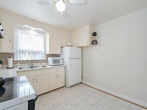 76 Cannon Rd, Toronto, ON - Indoor Photo Showing Kitchen With Double Sink
